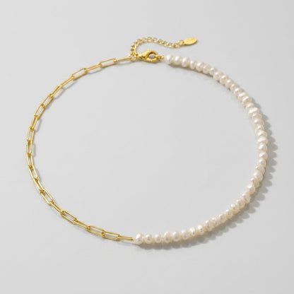Bracciale e collana a graffetta Rhoni con perla