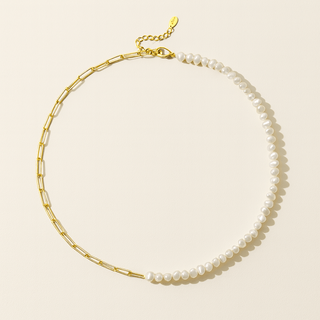 Bracciale e collana a graffetta Rhoni con perla